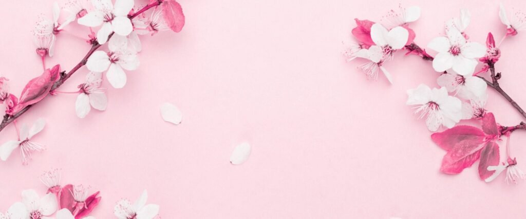 May flowers. Spring blossom and April floral nature on pink background. Beautiful scene with blooming tree. Easter Sunny day. Orchard abstract blurred background. Springtime.